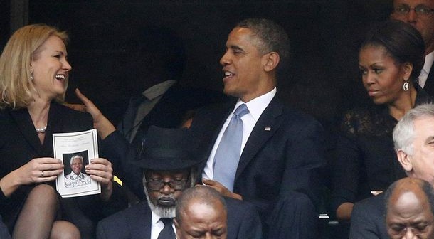 Michelle-Obama-unhappy-at-Mandela-memorial-e1429738491313.jpg